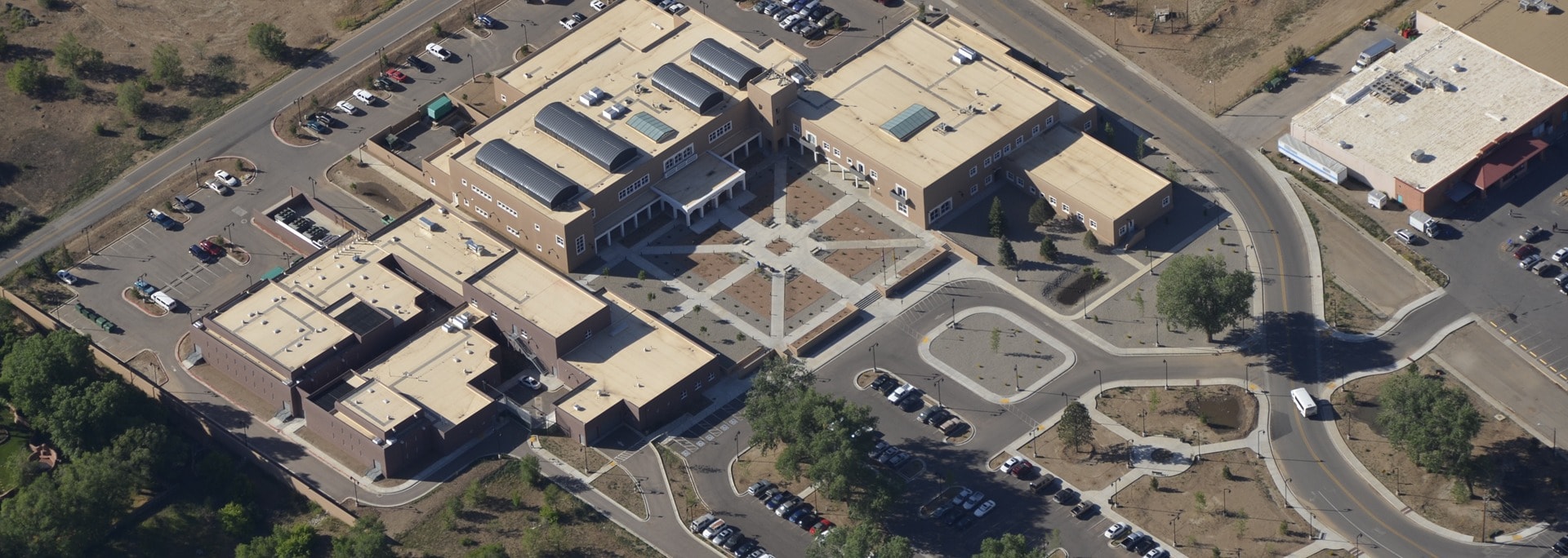 Aerial view of commercial campus with solar panels